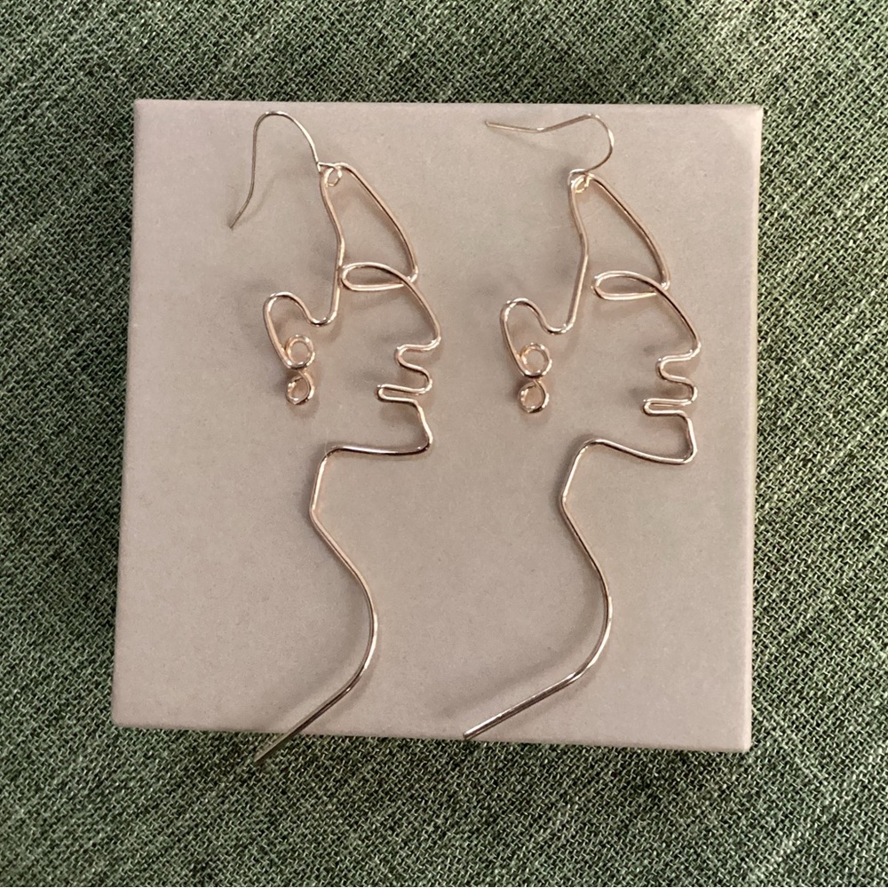 Abstract Silhouette Face Earrings